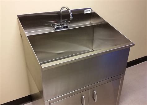 building base cabinet around restaurant steel sink|converting base cabinet to sink.